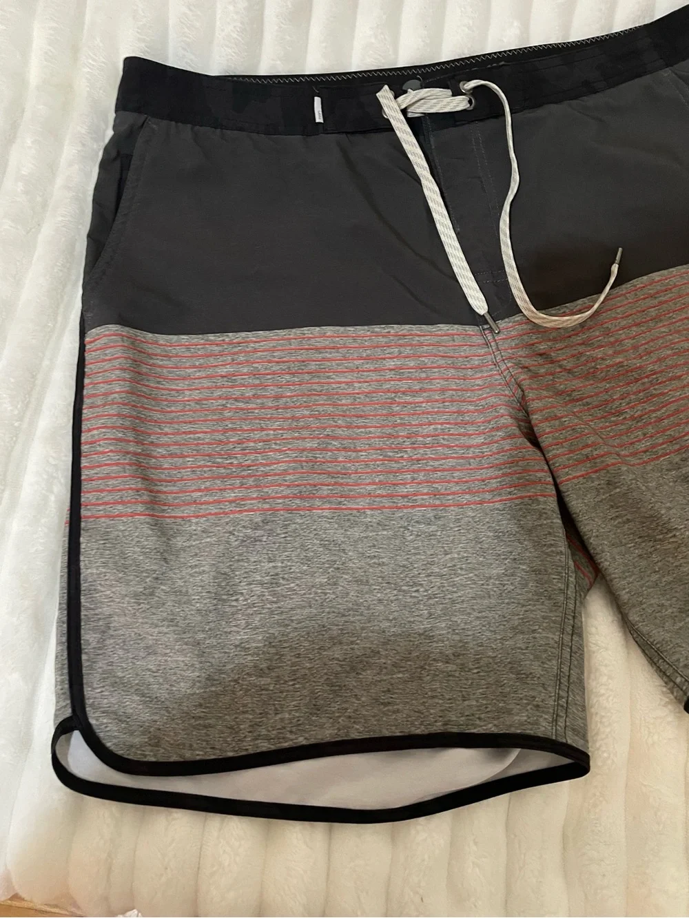 Vuori Men's Swim Shorts in Black with Dusty Rose Accent